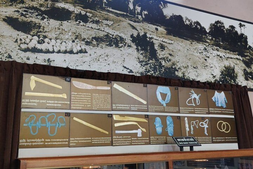 A display board with various tools and equipment, possibly for outdoor activities. 4