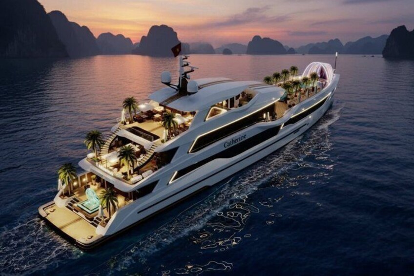 A large yacht named 'Catherine' with multiple decks, outdoor seating, and a flag. 2