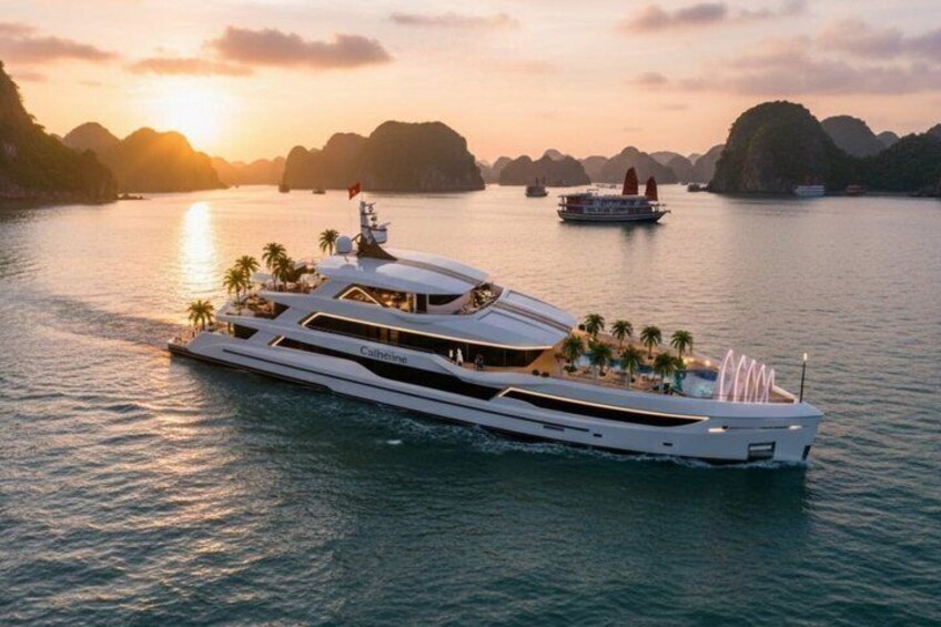 A large yacht with multiple decks and palm trees, sailing on a calm sea with a sunset in the background. 1