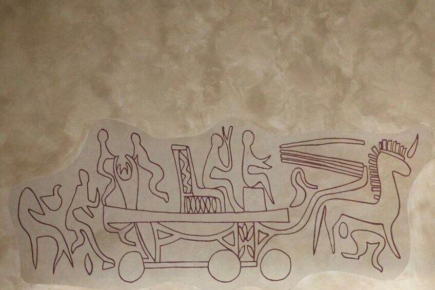 A line drawing of a chariot with figures and a horse. 3