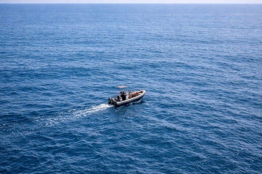 A boat on a large body of water. 3