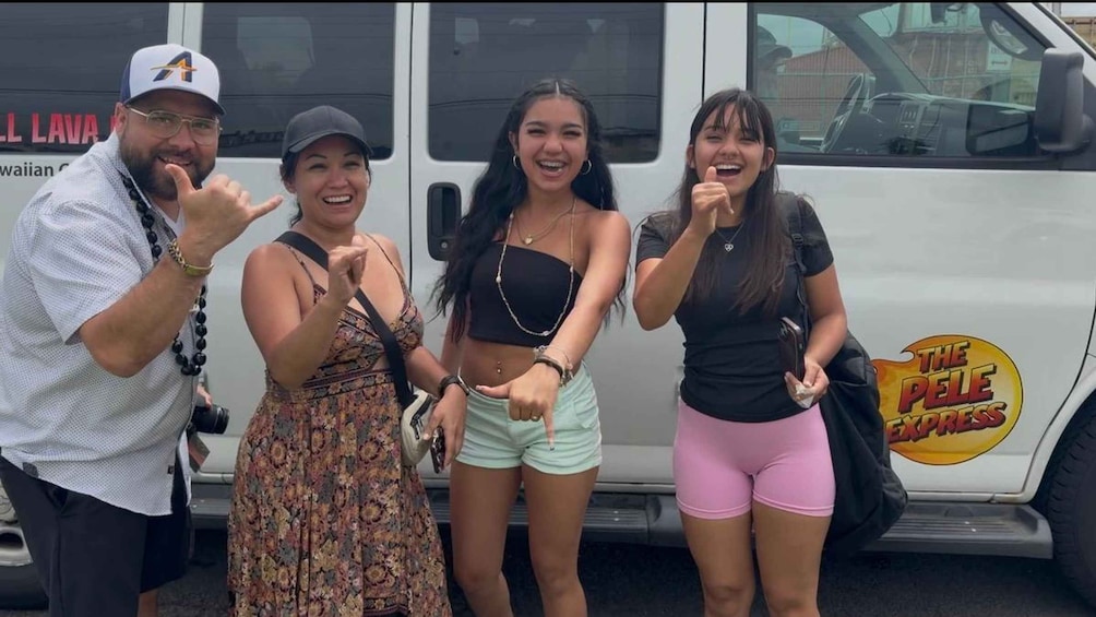 Four people posing in front of a food truck with a logo that reads 'THE PELLE EXPRESS'. 3
