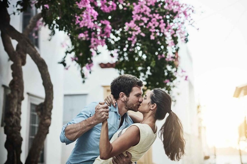 A couple dancing under a flowering tree. 1