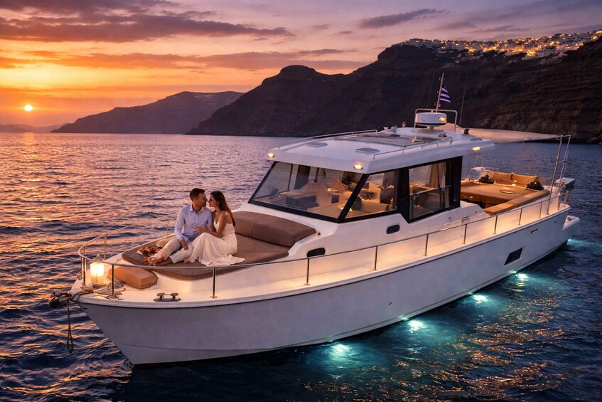 A white yacht with a covered deck, passengers, and a sunset over a coastal town. 3