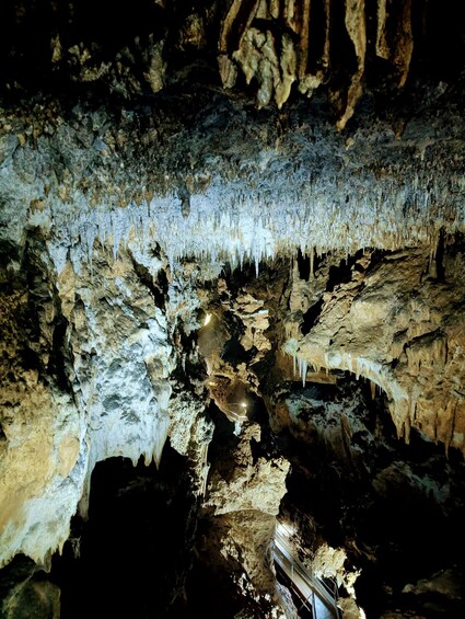 A cave with stalactites and stalagmites. 2