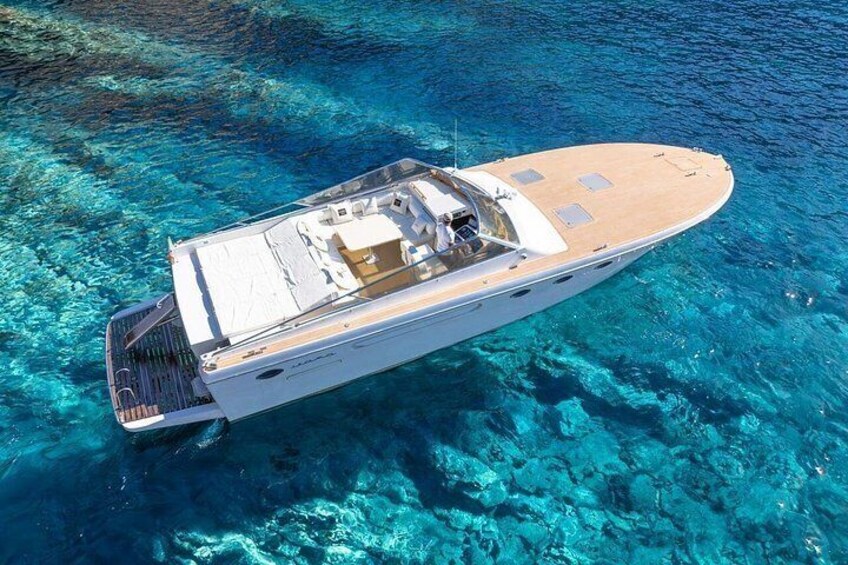 A large yacht on clear blue water. 5