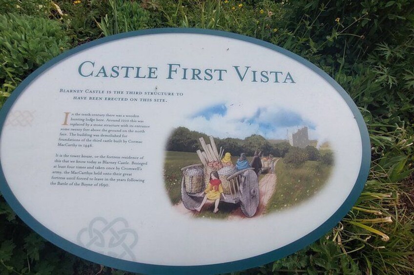 A historical plaque titled 'Castle First Vista' with a picture of a castle and text about its history. 3