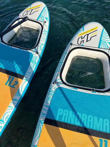 Two hydrofoil kayaks with 'GT' branding and '11.2' on their hulls. 3