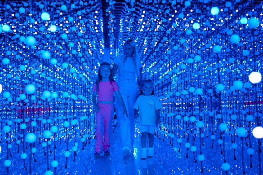 A tunnel with hanging lights. 5