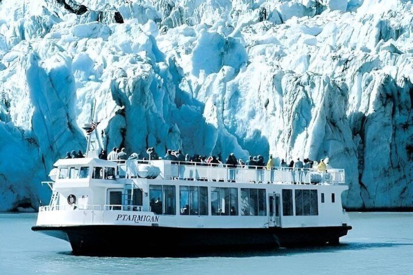 A boat named PTARMIGAN on a glacier. 1