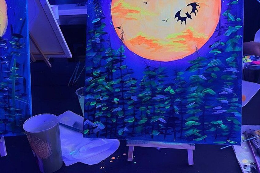 A painting of a full moon with bats and a forest. 2