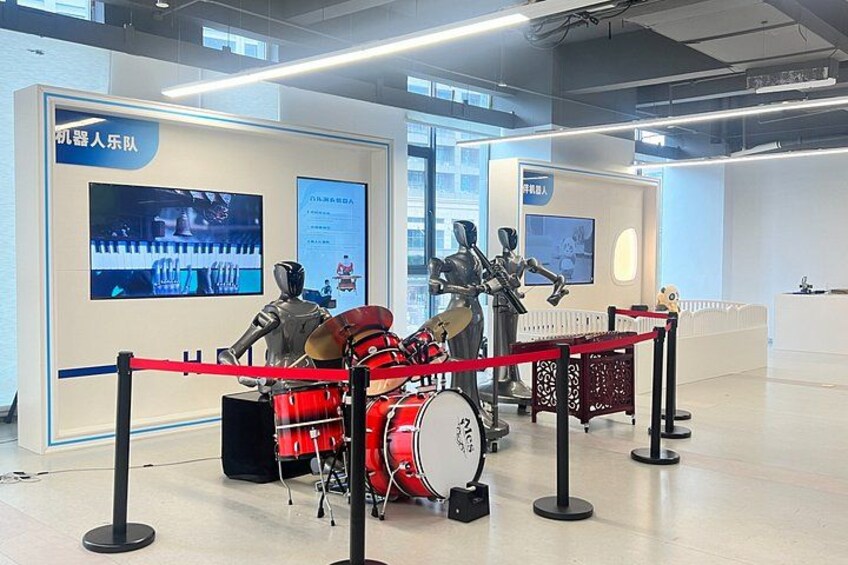 A robotics exhibition with various robotic models and displays. 3