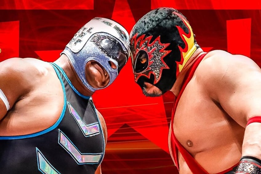 Two wrestlers in black and red uniforms with distinctive masks. 1