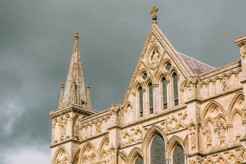 A Gothic-style cathedral with pointed arches and intricate stone carvings. 2