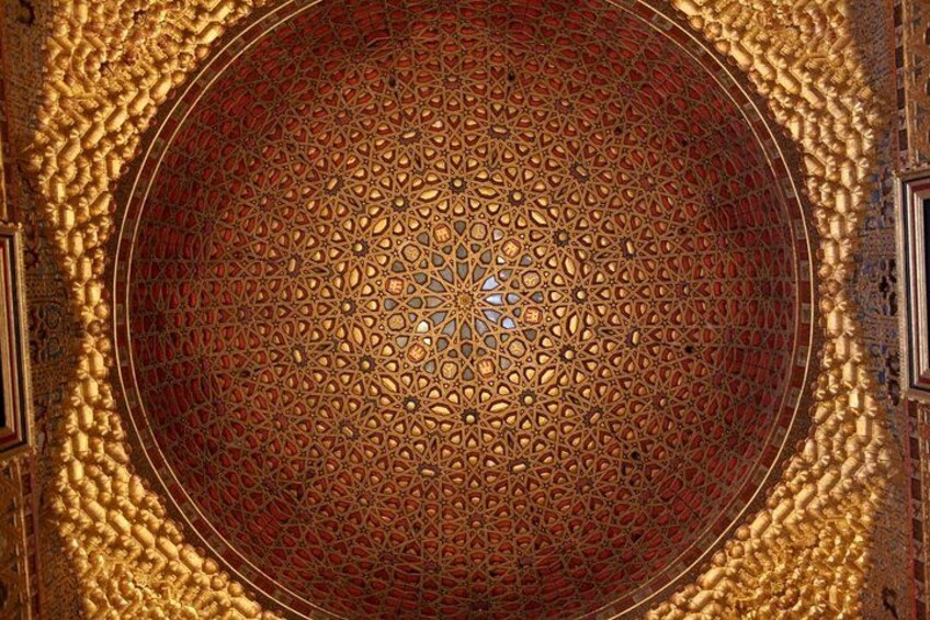 A detailed circular mosaic with intricate geometric patterns. 3