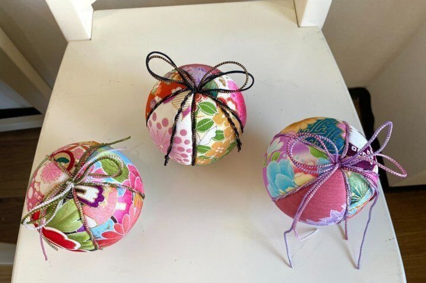 Three decorated Easter eggs on a white surface. 2