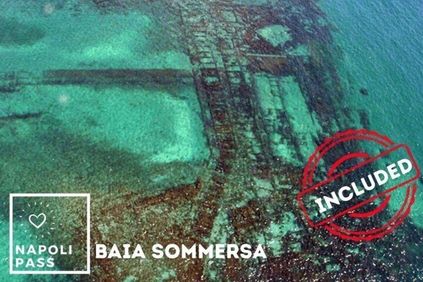An underwater view of the Baia Sommersa in Napoli Pass, with visible shipwreck structures. 3