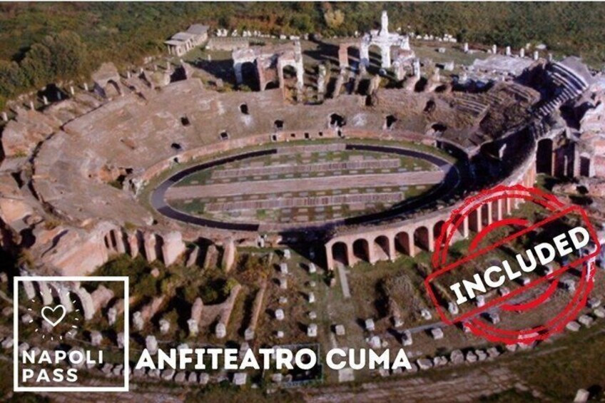 The ancient amphitheater of Anfiteatro Cumae with stone seating and a central stage. 5