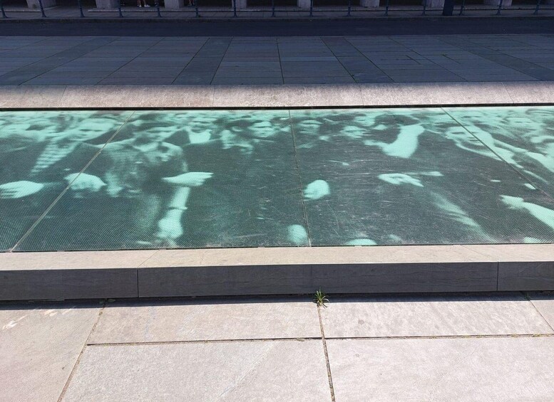 A reflective surface with tree silhouettes. 3