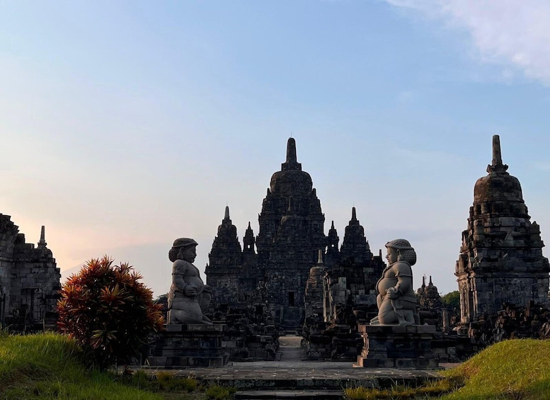 A temple complex with multiple stone structures and statues. 4