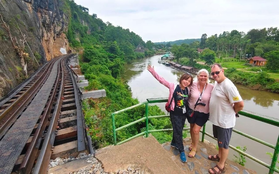 A railway track, a river, and a bridge. 5