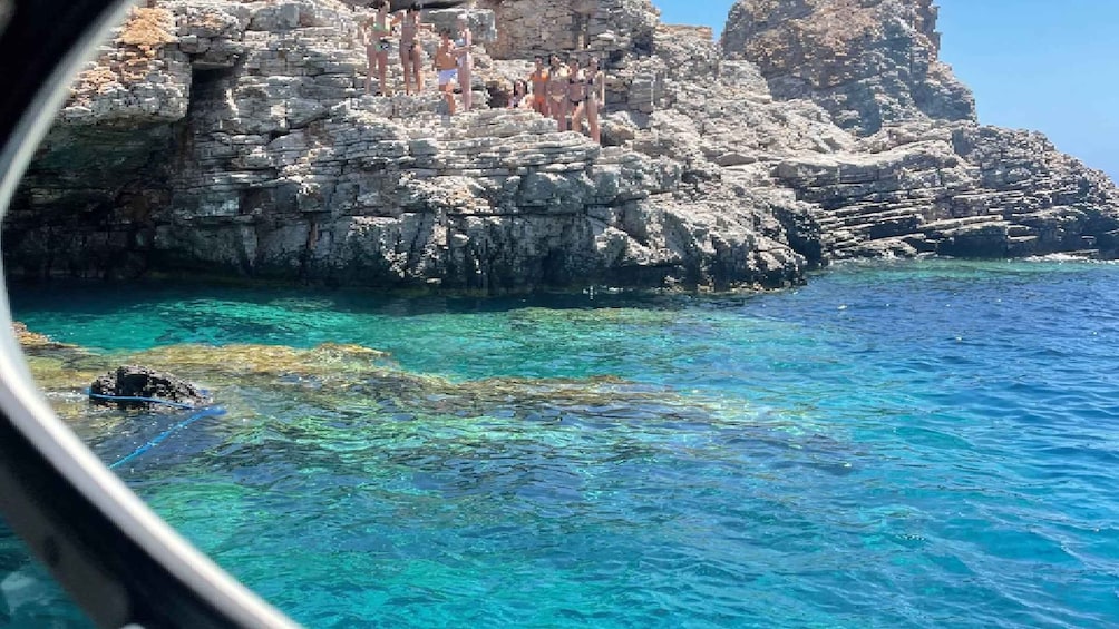 A rocky coastline with clear turquoise water. 3