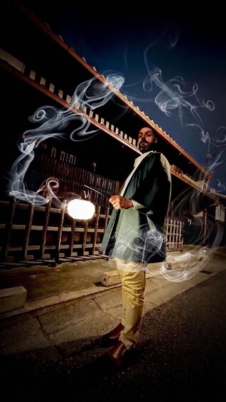 A person with a glowing object, surrounded by smoke effects, in an outdoor setting at night. 1