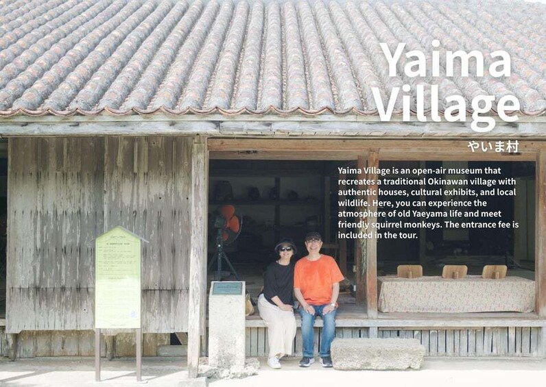 A traditional Okinawan village with a tiled roof and wooden walls. 1