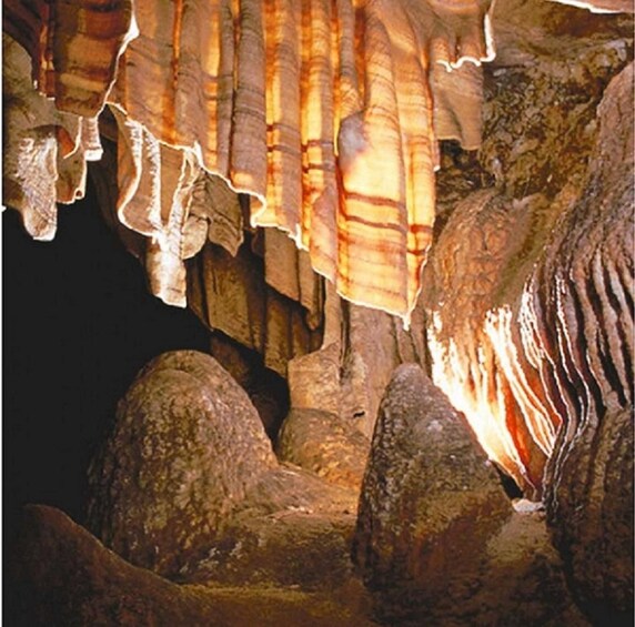 A cave with stalactites and stalagmites. 2