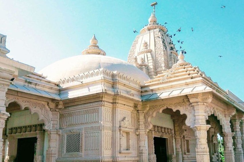 A temple with intricate carvings and a large dome. 2