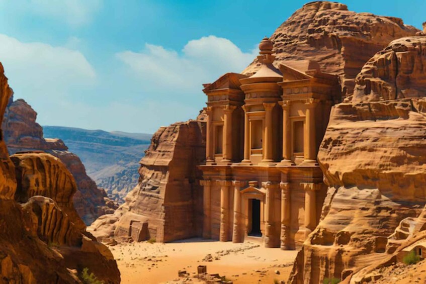 A rock-cut structure with columns and a central doorway, surrounded by rugged sandstone cliffs. 4
