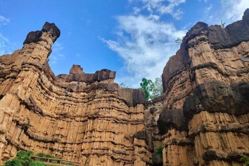 Layered rock formations with a clear sky. 1