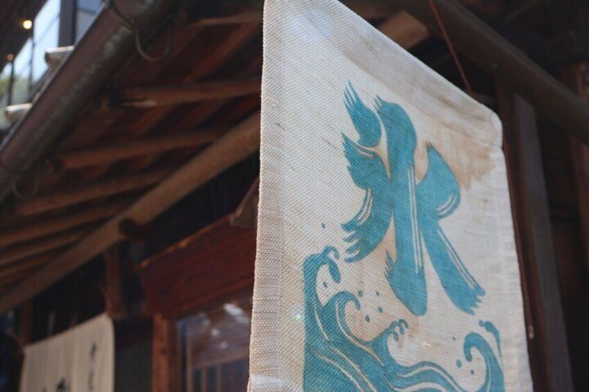 A traditional Japanese paper with a blue wave pattern. 3