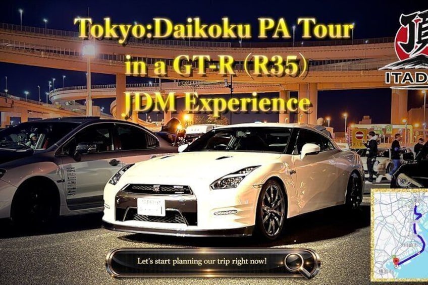 A white GT-R (R35) at a Tokyo: Daikoku PA Tour event. 1