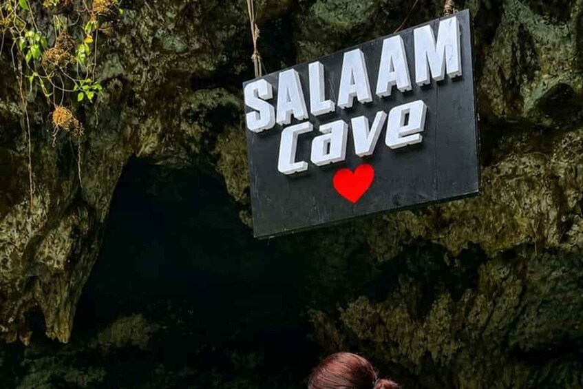 A sign reading 'SALAAM Cave' with a heart symbol. 5