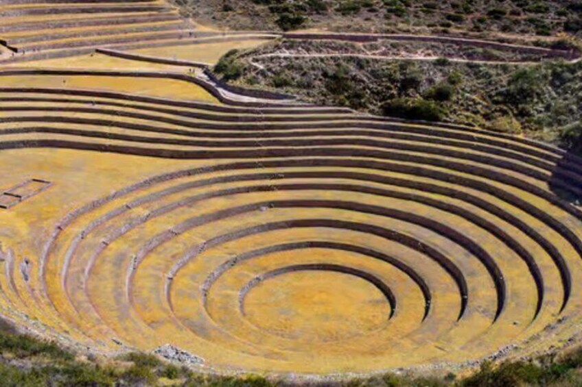 Terraced fields with a circular pattern, likely used for agriculture. 4
