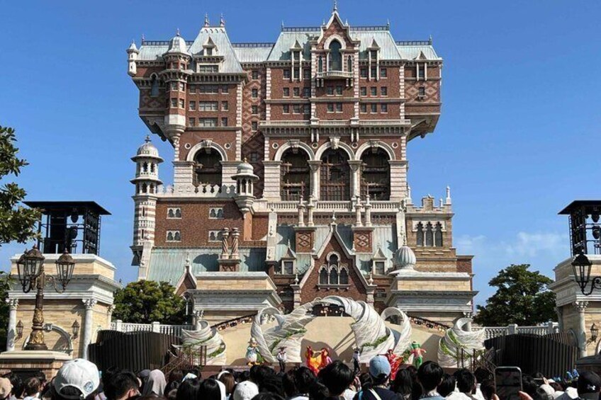 A large, ornate building with a distinctive architectural style, likely a historic or cultural landmark. 5