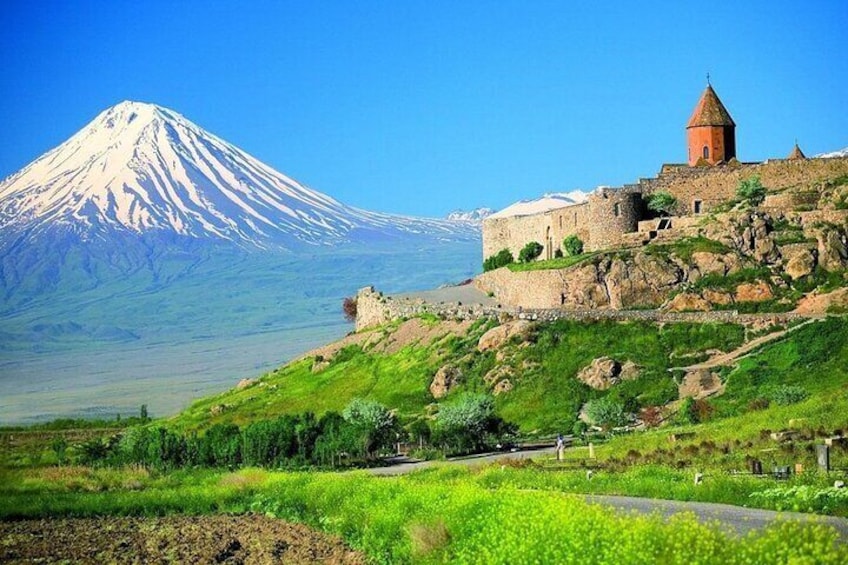 A mountain with a church on its slopes. 1