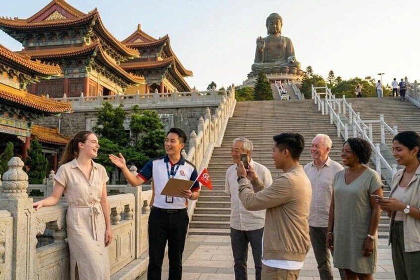 A group of people near a large Buddha statue and traditional Chinese architecture. 4