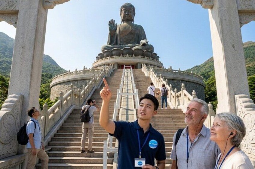 A large Buddha statue, a staircase leading to it, and a mountainous landscape. 2