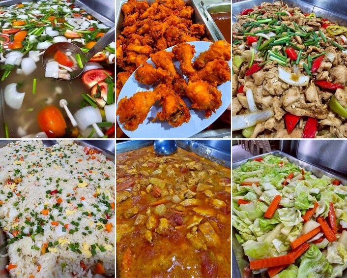 A variety of dishes including fried chicken, stir-fried vegetables, fried rice, and a curry dish. 3