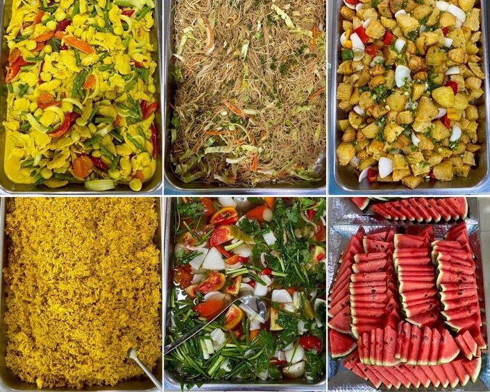 A variety of food dishes in trays. 4