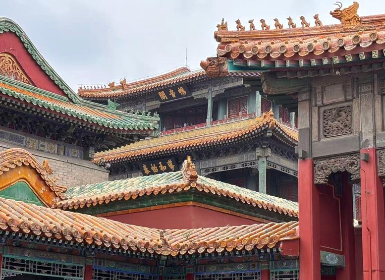 Traditional Chinese architecture with ornate roofs and intricate carvings. 2