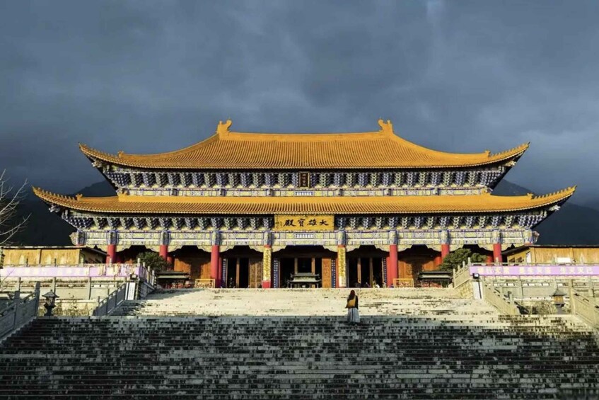 A traditional Chinese building with a multi-tiered roof and ornate decorations. 1