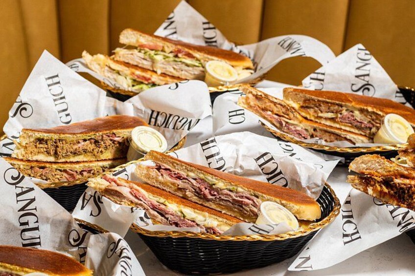 Sandwiches in baskets with paper labels. 2