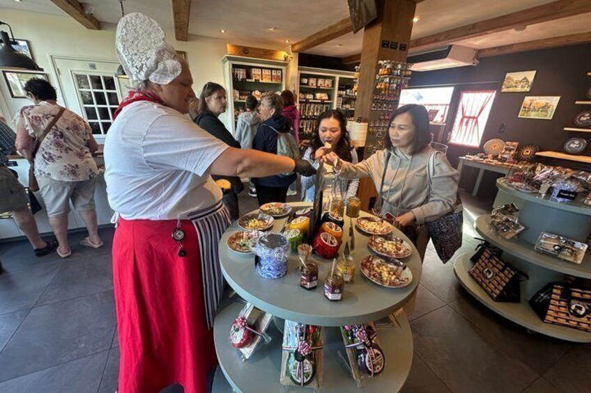 A chef serving food to customers in a restaurant. 3