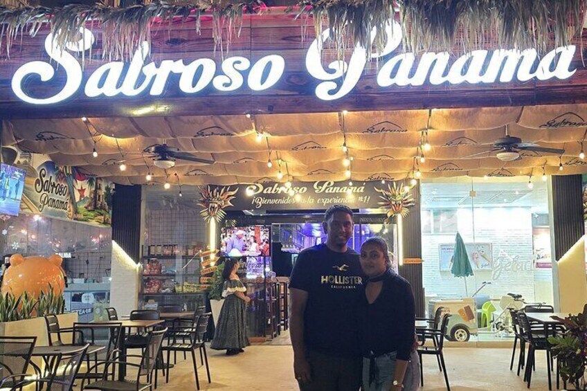 A restaurant named 'Sabroso Panama' with outdoor seating and a tropical decor. 5
