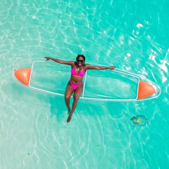 A person in a pool with a surfboard. 4