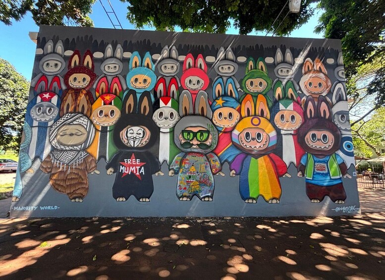 A colorful mural of various cartoon characters on a wall. 2