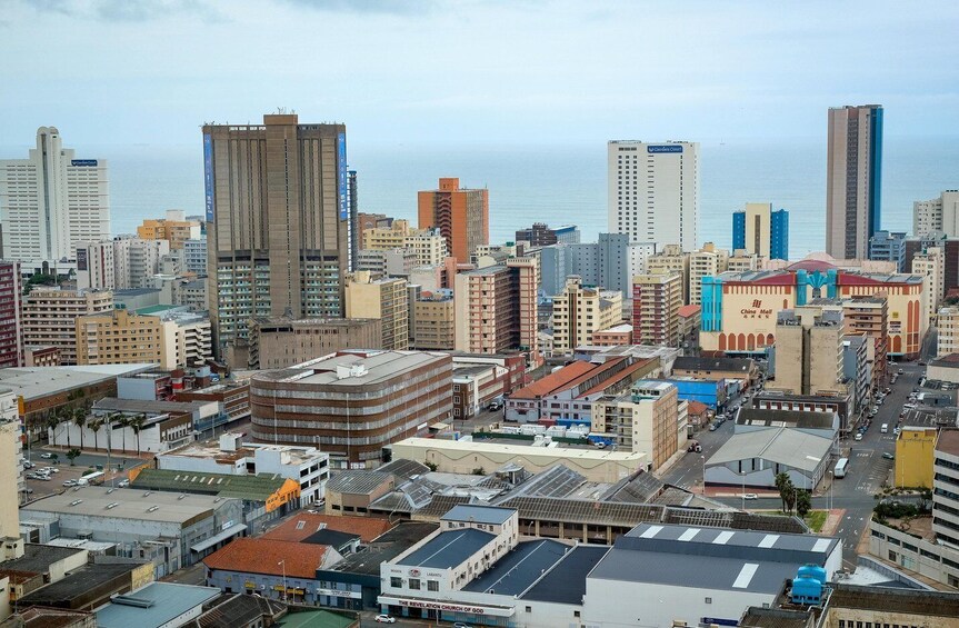 A cityscape with various buildings, including a prominent China Mall. 5